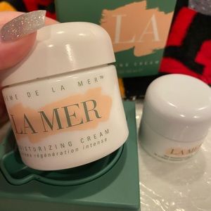 Creme de la mer and moisturizing cream jars empty
